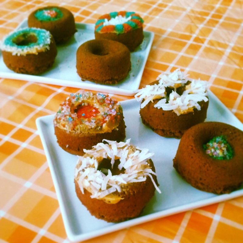 Frosted doggy donuts on a plate